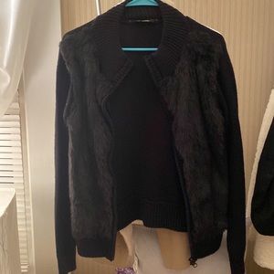 Black sweater/fur coat